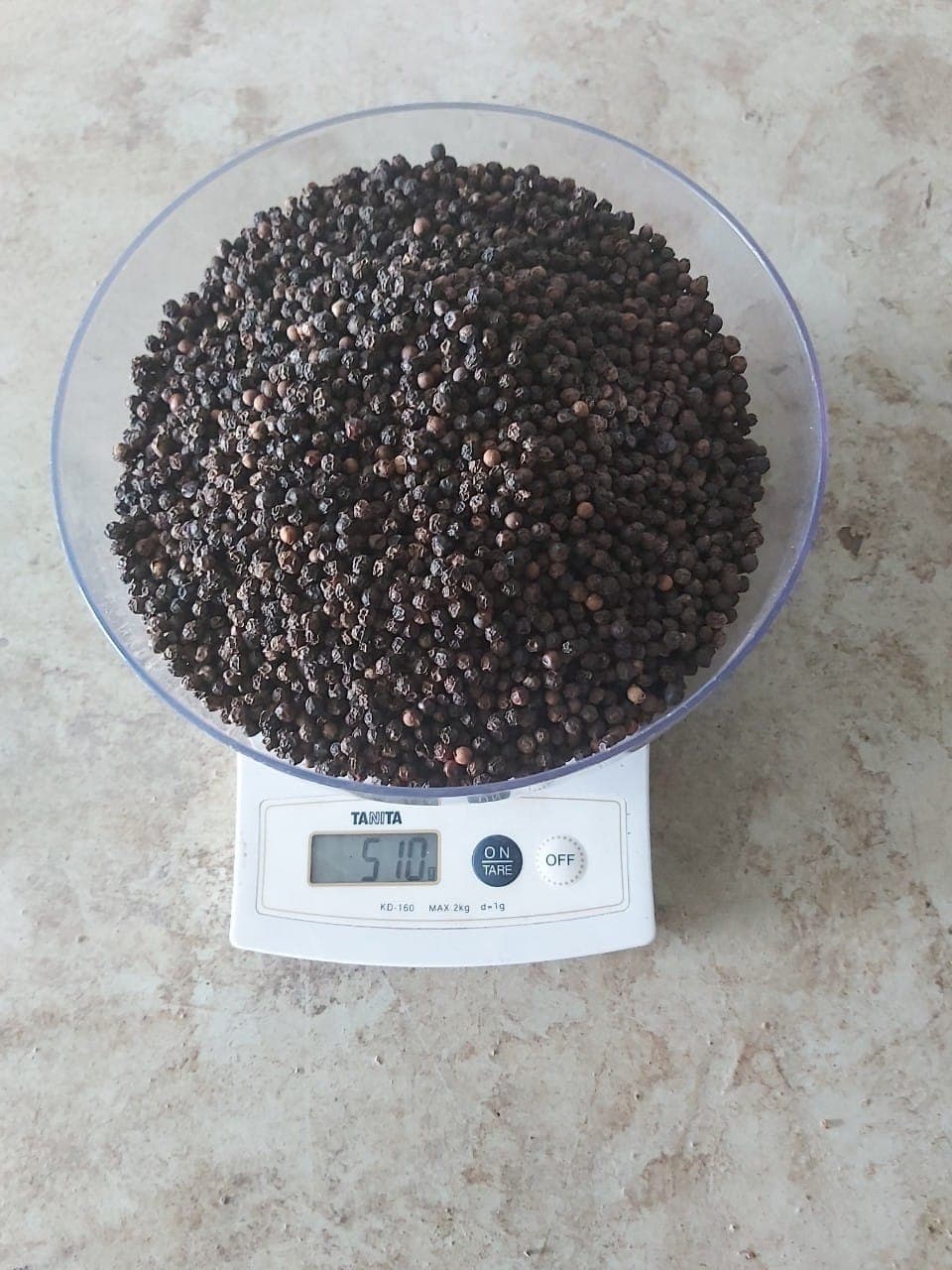 Black pepper weighed for sampling