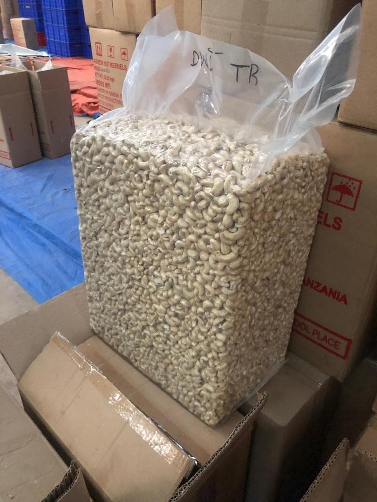 Cashew kernels, vacuum-sealed block